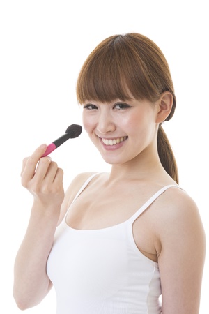 The young woman who makes upの写真素材