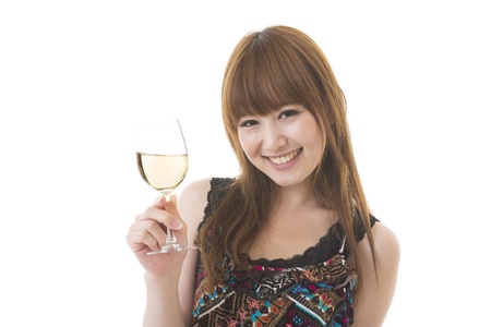 The young woman who drinks wineの写真素材