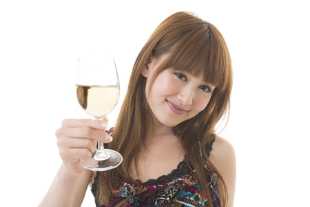The young woman who drinks wineの写真素材