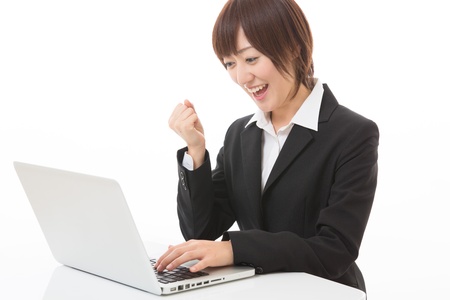 Young businesswoman who uses the computerの写真素材
