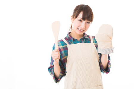 The young woman who cooksの写真素材