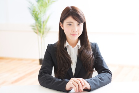 Young businesswoman who smile in a officeの写真素材