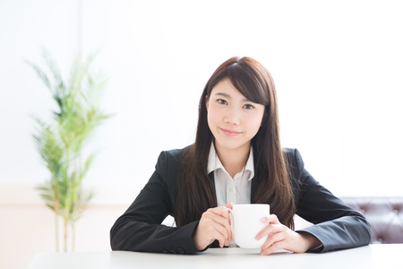 The young businesswoman who takes a breakの写真素材