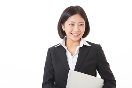 Young businesswoman who uses the computerの写真素材