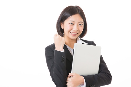 Young businesswoman who uses the computerの写真素材