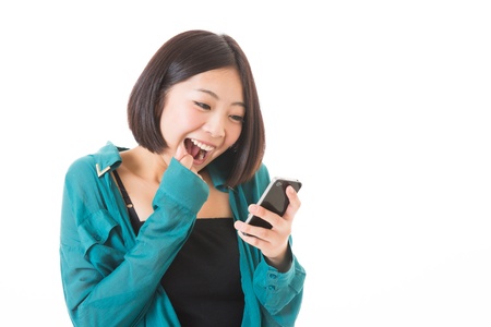 Young woman to see a smart phoneの写真素材