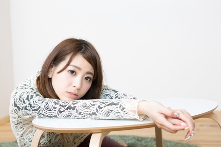 young woman who gets tiredの写真素材