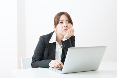 young businesswoman who is troubledの写真素材