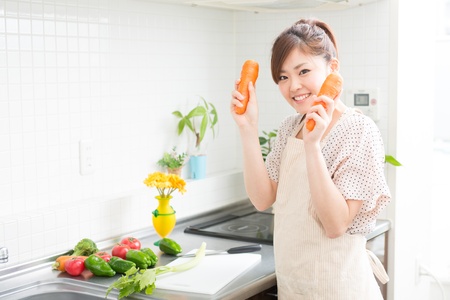 woman who cooks with an apron figureの写真素材