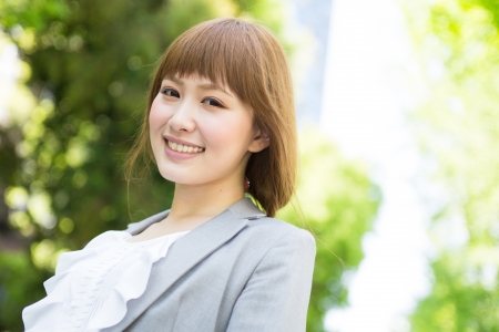 Beautiful young asian businesswoman smilingの写真素材