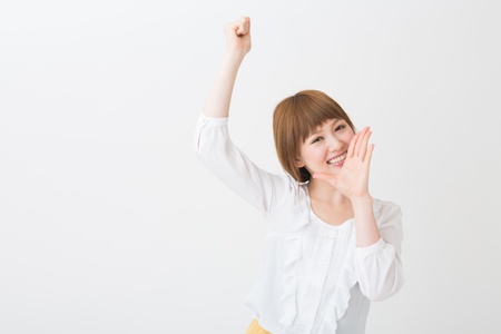 The young businesswoman who is cheeringの写真素材