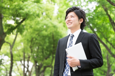 young businessman using tablet computerの写真素材