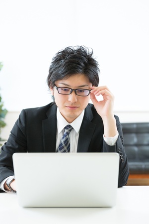 young businessman using computerの写真素材
