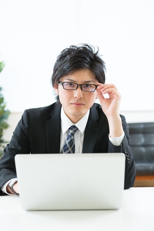 young businessman using computerの写真素材