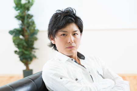 Young man who was relaxedの写真素材