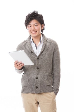 young man using tablet computerの写真素材
