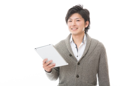 young man using tablet computerの写真素材