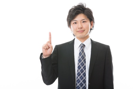 businessman indicating the number oneの写真素材