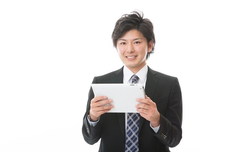 young businessman using tablet computerの写真素材