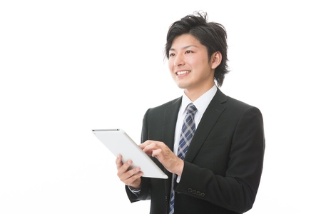 young businessman using tablet computerの写真素材