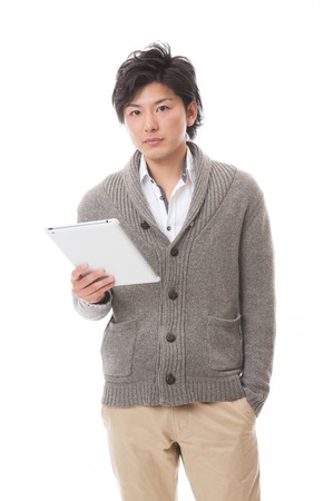 young man using tablet computerの写真素材