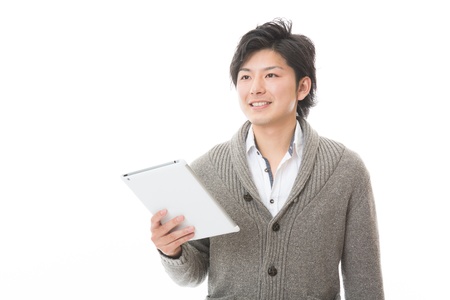 young man using tablet computerの写真素材