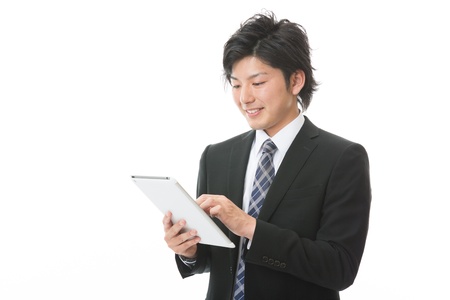 young businessman using tablet computerの写真素材
