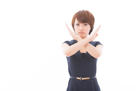 young attractive asian woman to refuseの写真素材
