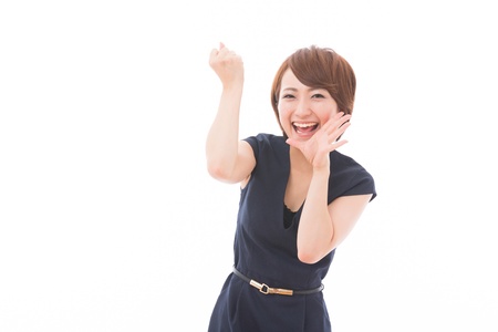 Beautiful young asian woman who is cheeringの写真素材
