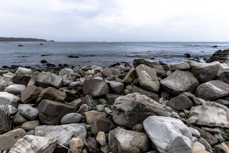 Rugged rocky and sea in Japanの写真素材