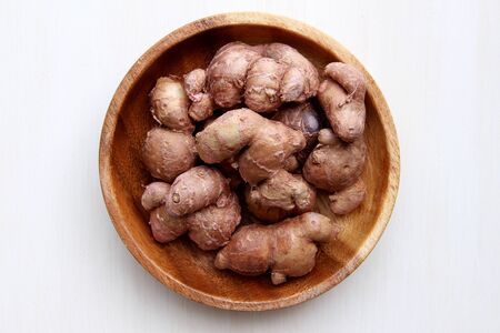 Kra Chai Dum on white wood table.の写真素材