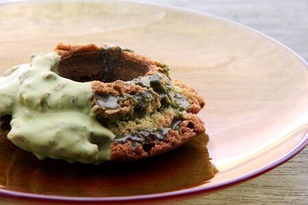 Matcha donut on glass dishの写真素材