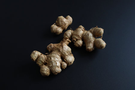 Black turmeric placed on a black background.の写真素材
