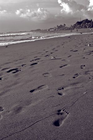 Foot step print left on the beach of Petitenget Baliの写真素材