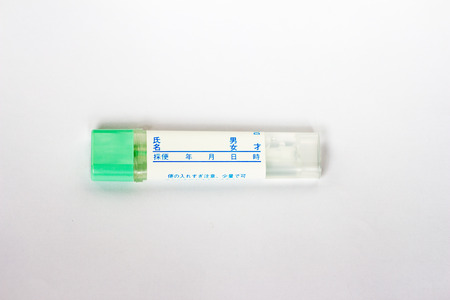 Container of feces examination in Japan