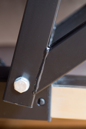 hex screw right beside welded placeの写真素材