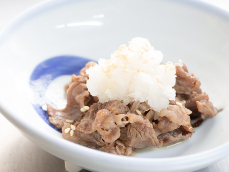 Japanese cuisine, sliced beef with grated Japanese daikon radish in the bowlの写真素材