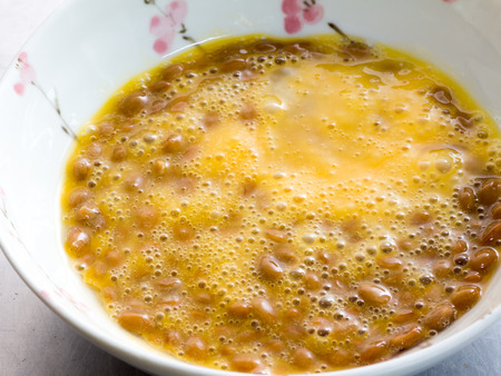 Japanese cuisine, fermented soybeans called Natto with a raw eggの写真素材