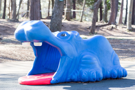 Playground equipment, yawning blue hippopotamusの写真素材