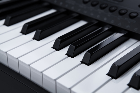 black and white keys of the piano closeup