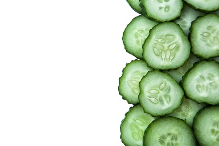 stack of  sliced cucumbers on white backgroundの写真素材