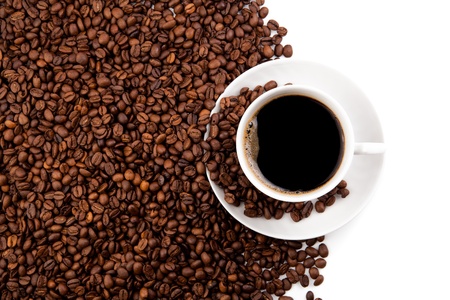 cup of black coffee and roasted coffe beans on a white backgroundの写真素材