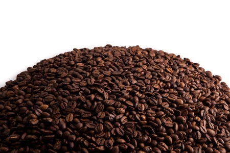 roasted coffee beans on a white backgroundの写真素材