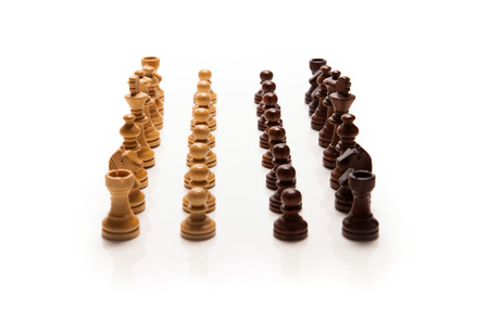 Chess pieces set on white backgroundの写真素材