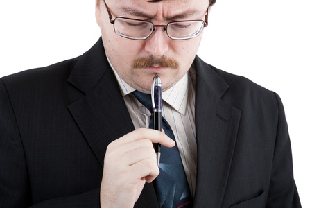 man is thinking for written work on a white backgroundの写真素材