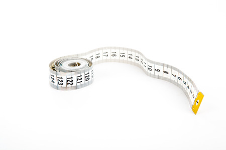 rolled centimeter ruler on a white background