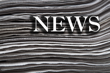 large stack of newspapers closeup and macroの写真素材