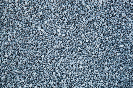 texture of cemented stones of granite closeupの写真素材