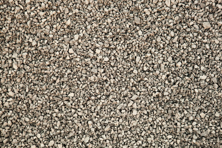 texture of cemented stones of granite closeupの写真素材