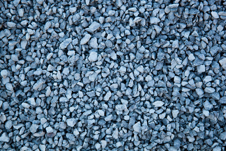 texture of cemented stones of granite closeupの写真素材